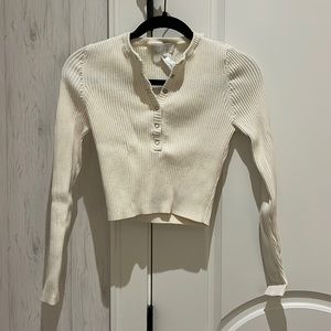 Cream Fleur de mal long sleeve crop top